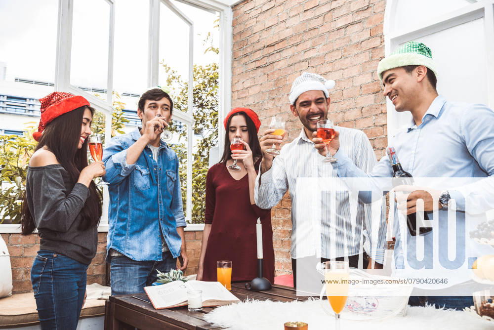 Outdoor Xmas party shot of young people toasting drinking glass at a rooftop terrace as forever friendship. Young friends hang out with alcohol drinking and juice. Christmas and New year party theme., model released, , 39659524.jpg, xmas, friendship, christmas, party, new year, wine, deck, fun, family, friend, group, culture, holiday, friends, terrace, young, rooftop, people, celebration, beer, summer, drink, outdoors, cheerful, youth, leisure, women, balcony, happy, outdoor, happiness, food, smiling, men, togetherness, carefree, female, together, caucasian, male, lifestyle, meal, alcohol, enjoyment, diversity, laugh, roof, eating, traditional, festival RECORD DATE NOT STATED
