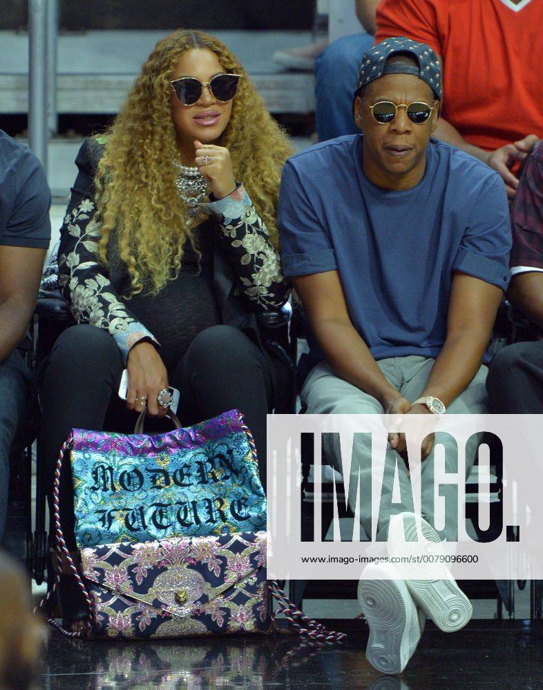 Beyonce and Jay Z sit courtside as they attend Game 7 of the best-of-seven first round playoffs between the Los Angeles Clippers and the Utah Jazz at Staples Center in Los Angeles on April 30, 2017. Beyonc? Knowles and Shawn ÒJay ZÓ Carter have welcomed twins in one of the most highly anticipated celebrity births, according to multiple reports Sunday. One of those reports was granddad himself, Matthew Knowles, who blasted the news on Twitter with a Father s Day post reading ÒTheyÕre here!Ó and ÒHappy Birthday to the twins! File LAP2017061804 JIMxRUYMEN