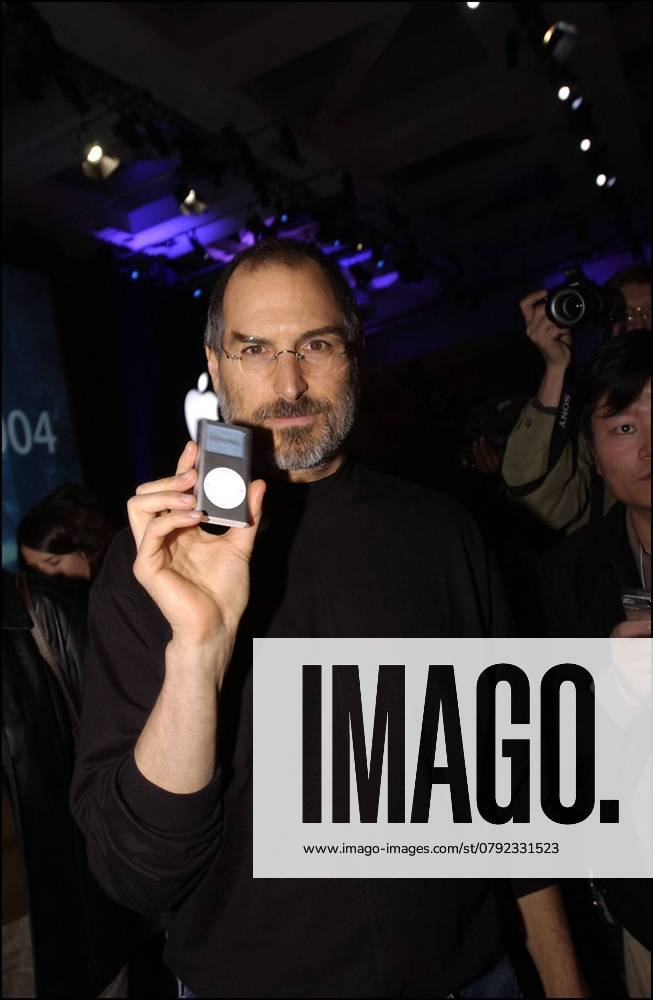 Files pictures of Steve Jobs Apple CEO Steve Jobs show the new iPod Mini during his keynote address at Macworld Conference & Expo in San Francisco on January 6, 2004, where he introduced the iPod Mini, a mini version of its best-selling iPod music player. The Ipod Mini has the size of a business card and comes in 5 different colors. San Francisco United States