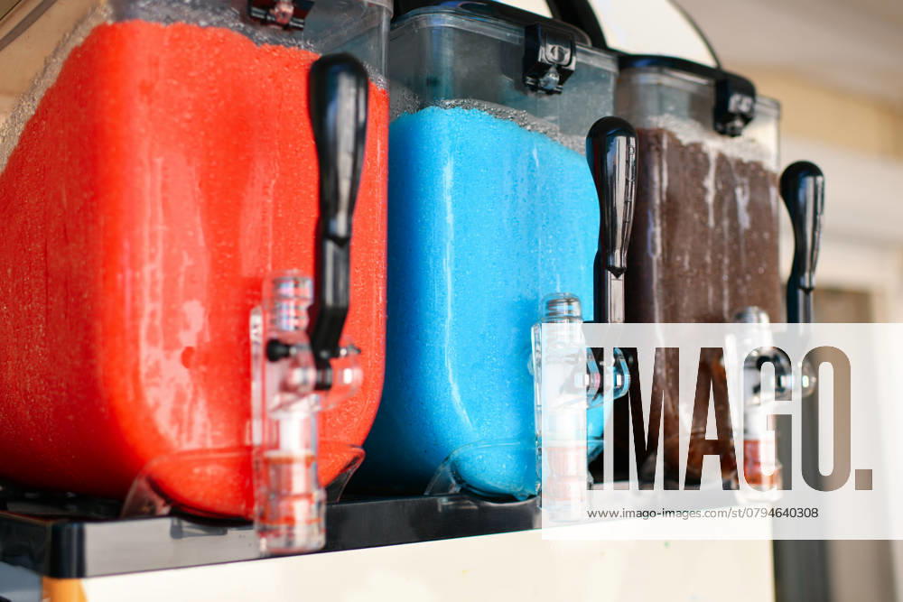 Ice granite containers Summer drink Juice machine , 47699880.jpg, bar, beverage, blue, buffet, closeup, cocktail, cola, cold, color, colored, container, cool, crane, cream, crushed, cup, dessert, device, dispenser, drink, equipment, flavor, food, fresh, frozen, fruit, granita, green, homemade, ice, iced, icy, industry, juice, machine, maker, pink, plastic, recipe, red, refreshing, refreshment, slush, sorbet, strawberry, summer, sweet, syrup, taste, water RECORD DATE NOT STATED