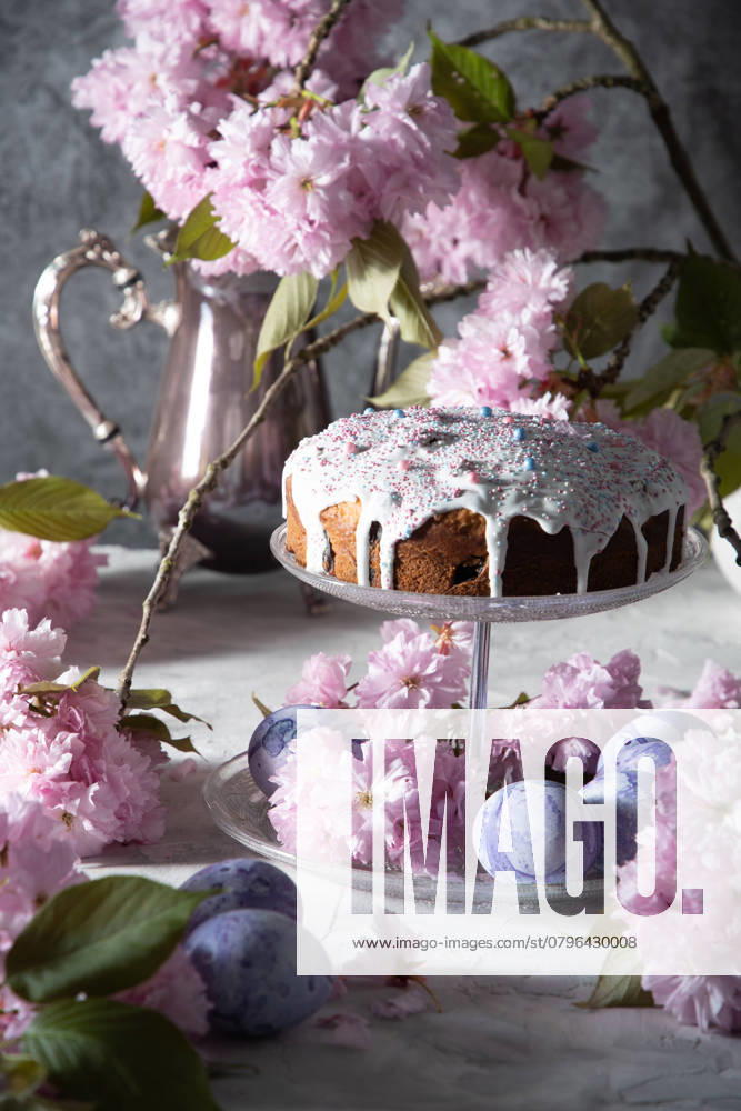 Beautiful Easter cake on the table, and colored eggs, homemade cakes, still life with a silver teapot on a background of pink sakura. High quality photo , 48415556.jpg, refined, flower, baking, bloom, branches, cherry, color, floral, pink, background, cake, decoration, easter, food, holiday, spring, sweet, traditional, dessert, egg, festive, homemade, kulich, religion, rustic, springtime, tradition, celebration, eggs, life, seasonal, still, baked, concept, decor, delicious, design, dough, easter cake, greeting, light, orthodox, orthodox sweet bread, pastry, pie, scene, season, still life, symbol, table RECORD DATE NOT STATED