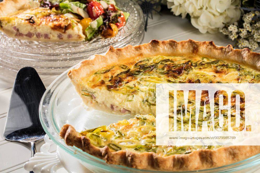 Chicago, IL, USA - In a variation on quiche Lorraine, ham and cheese flavor a simple custard of egg yolks and milk. Chicago USA - ZUMAm67_ 20170727_zaf_m67_074