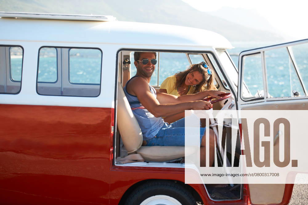 One of many stops on the open road. Young couple stopping to see the sights on their coastal road trip, model released, , 49689424.jpg, couple, road, trip, transportation, carefree, boyfriend, dating, girlfriend, kombi, outdoor, outdoors, mini van, relationship, road trip, togetherness, women, woman, man, female, people, portrait, happy, male, adult, cute, car, men, looking, sitting, teen, student, real, two, casual, handsome, together, laughing, guy, sea, open, sun, romance, active, ocean, van, driving, informal, look, laugh, bonding RECORD DATE NOT STATED