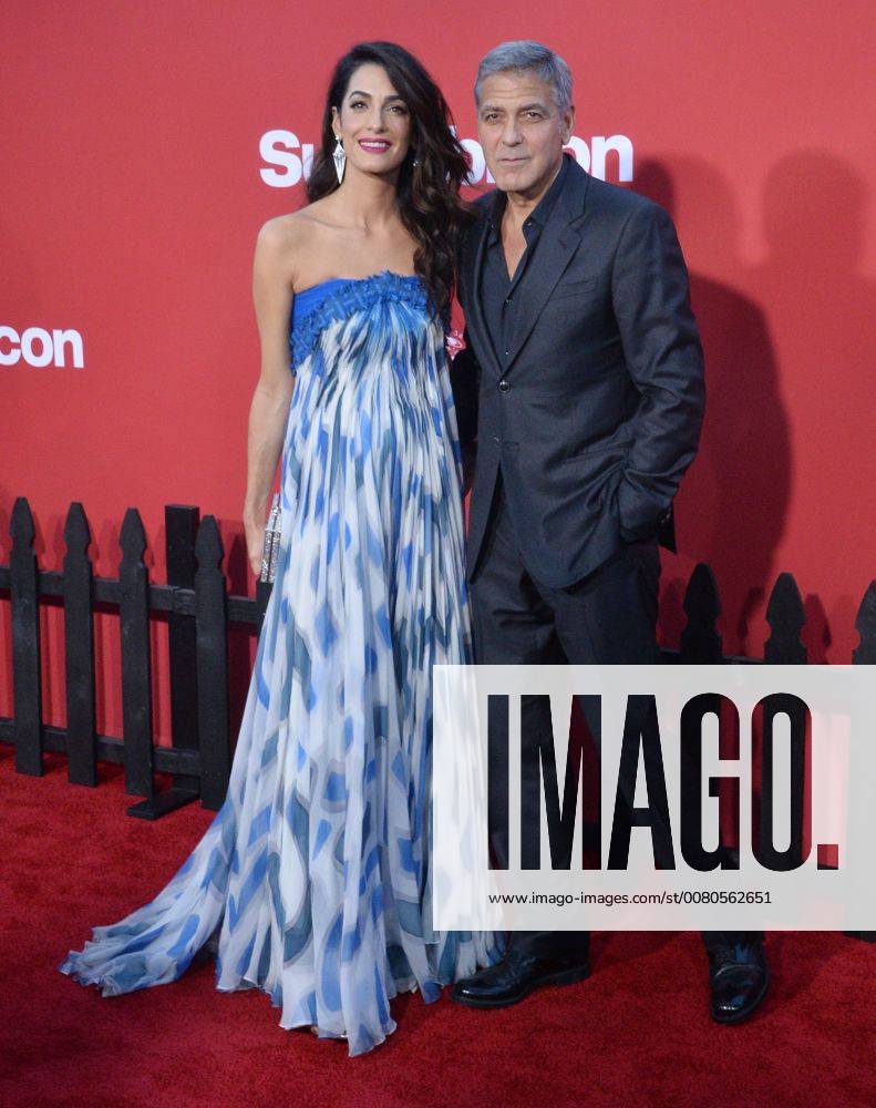 Director producer writer George Clooney and his wife, human rights attorney Amal Clooney attend the premiere of his new motion picture crime thriller Suburbicon at the Regency Village Theatre in the Westwood section of Los Angeles on October 22, 2017. Storyline: Suburbicon is a peaceful, idyllic suburban community with affordable homes and manicured lawnsÉthe perfect place to raise a family, and in the summer of 1959, the Lodge family is doing just that. But the tranquil surface masks a disturbing reality, as husband and father Gardner Lodge (Matt.Damon) must navigate the townÕs dark underbelly of betrayal, deceit, and violence. This is a tale of.very flawed people making very bad choices. This is Suburbicon. LAP2017102201 JIMxRUYMEN