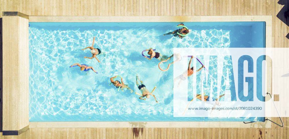 Top view of group of seniors doing water gymnastics in pool model released Symbolfoto property released PNPF00105