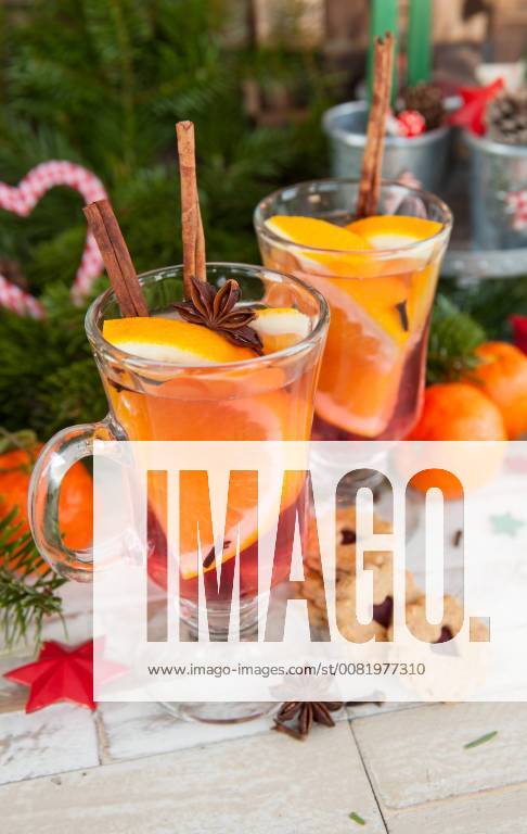 Hot punch with spices and orange hot mulled wine 1079704629