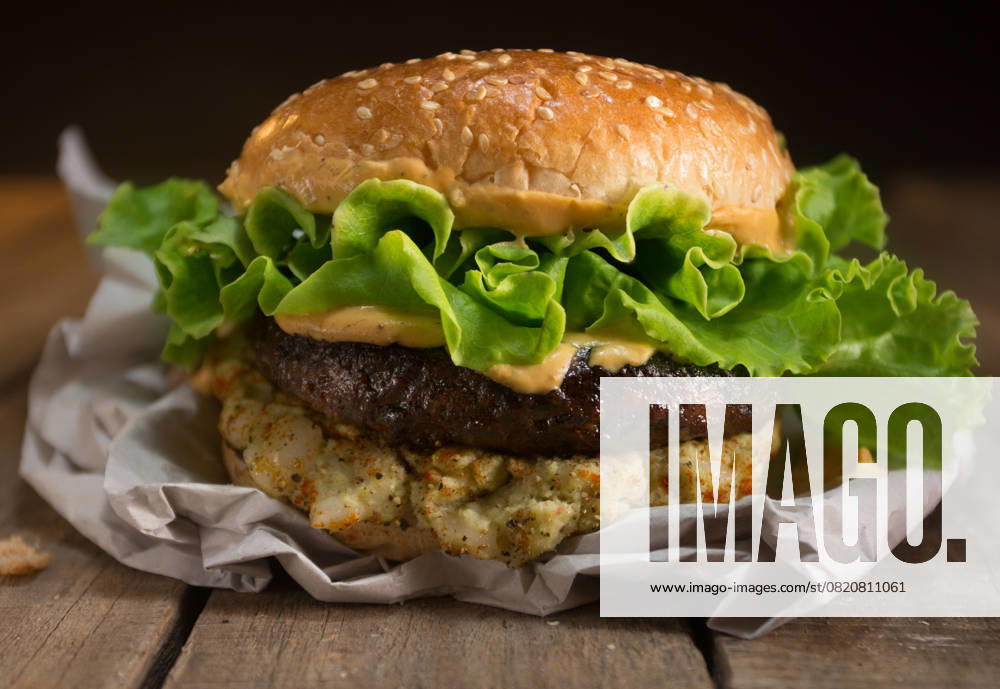 Rustic hamburger with cheese and lettuce Model Released DondykRiga_ID27586_792152_001
