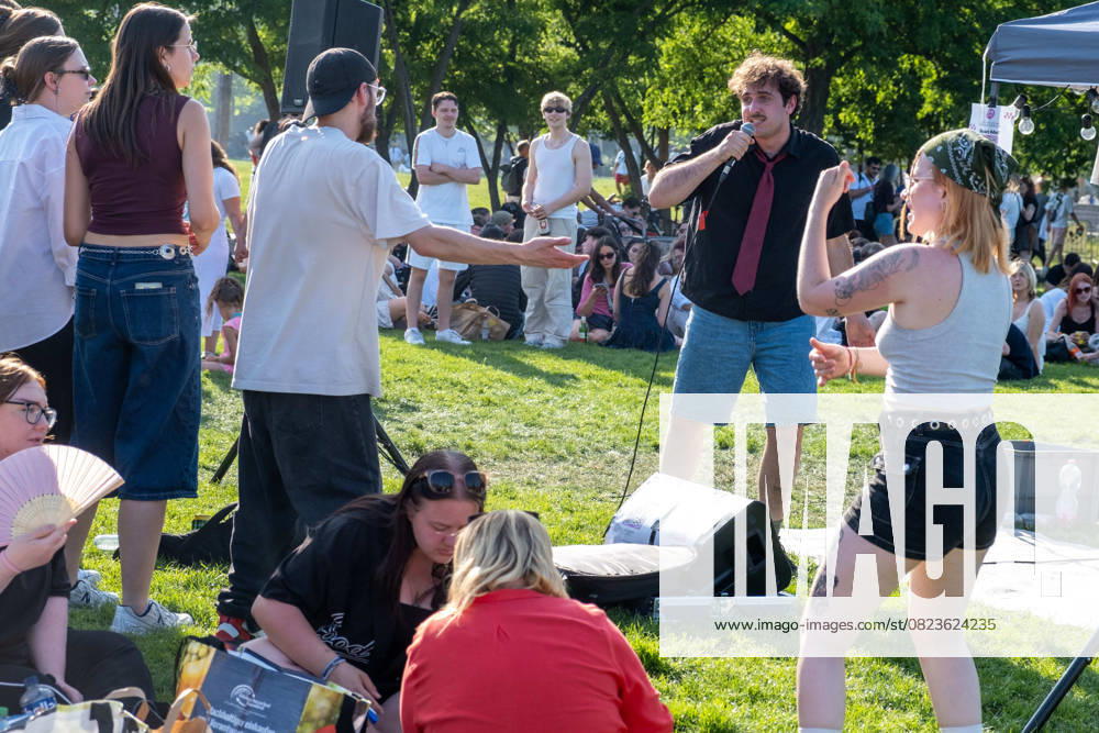 Fete de la Musique at the beginning of summer in Berlin Prenzlauer Berg A musician raps on the Lost Lives Shows stage in Mauerpark Fete de la Musique at the beginning of summer in Berlin Prenzlauer Berg A musician raps on the L sp2025062143474