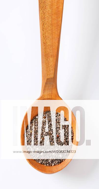 Spoon of healthy chia seeds on white background CTKPhotoF201805161198501