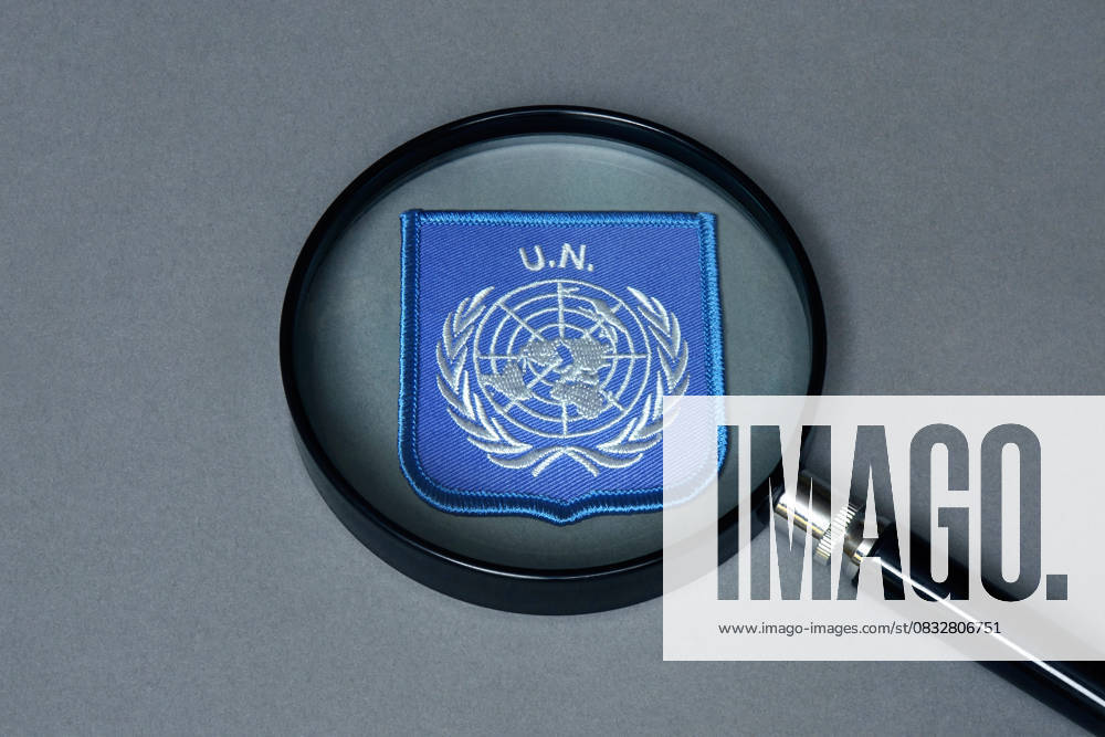 Magnifying glass with UN emblem Magnifying glass with UN emblem, 06 09 2025, Borkwalde, Brandenburg, There is a UN emblem under a magnifying glass