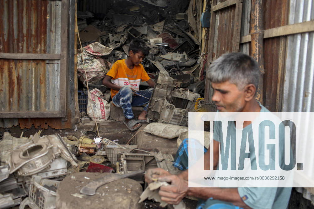 Daily Life In Bangladesh. A child laborer works in a plastic recycling factory under unsafe and unsanitary conditions in Bangladesh on October 5, 2025. Dhaka Bangladesh