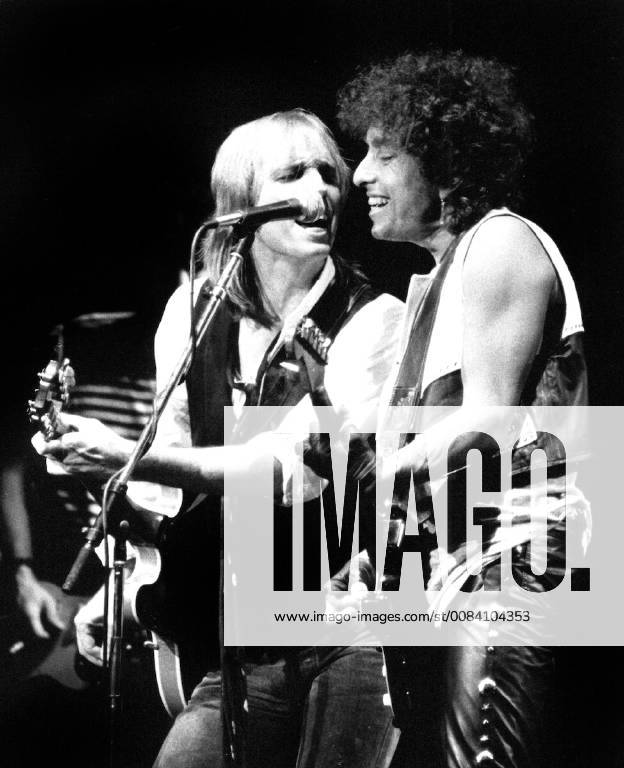 Tom Petty & Bob Dylan performing at Madison Square Garden in New York City in July 1986. © Gary Gershoff MediaPunch