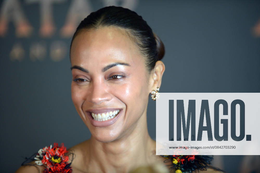 MIAMI, FLORIDA - DECEMBER 12: Zoe Saldana attends the Miami Special Screening of Avatar: Fire and Ash at AMC Sunset Place 24 in Miami, Florida on December 12, 2025.