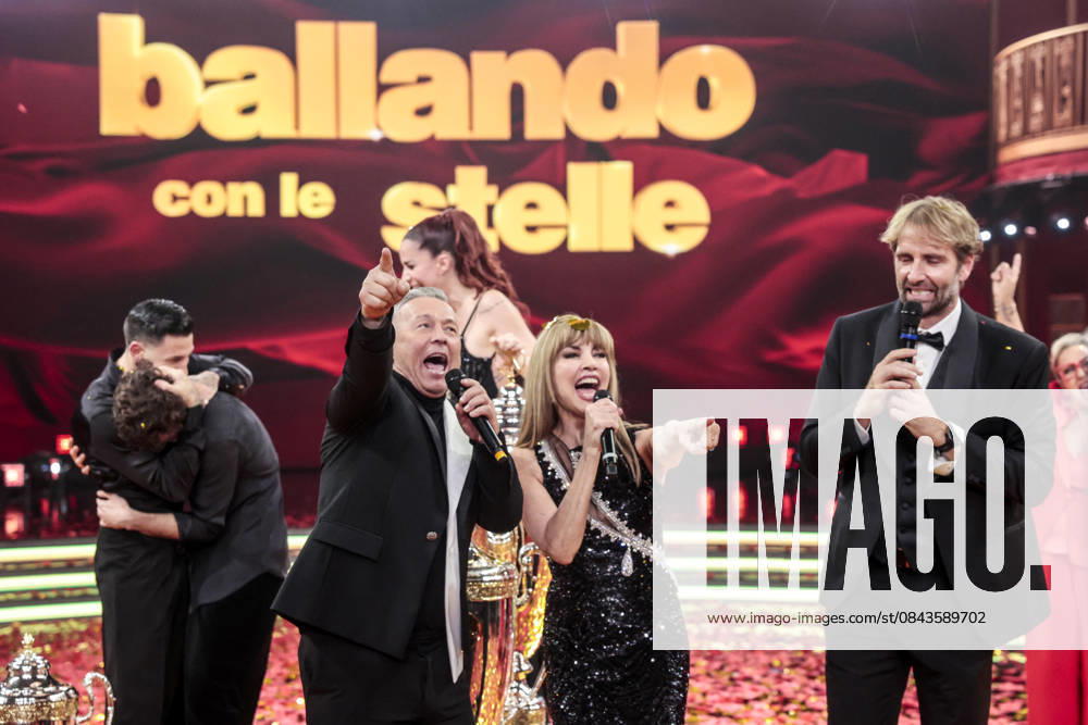 Dancing with the Stars television show, the finale. Pictured: Milly Carlucci with Paolo Belli and Massimiliano Rosolino. Rome, Italy 20 December 2025 Rome Italy - ZUMAa289 20251221_zia_a289_053