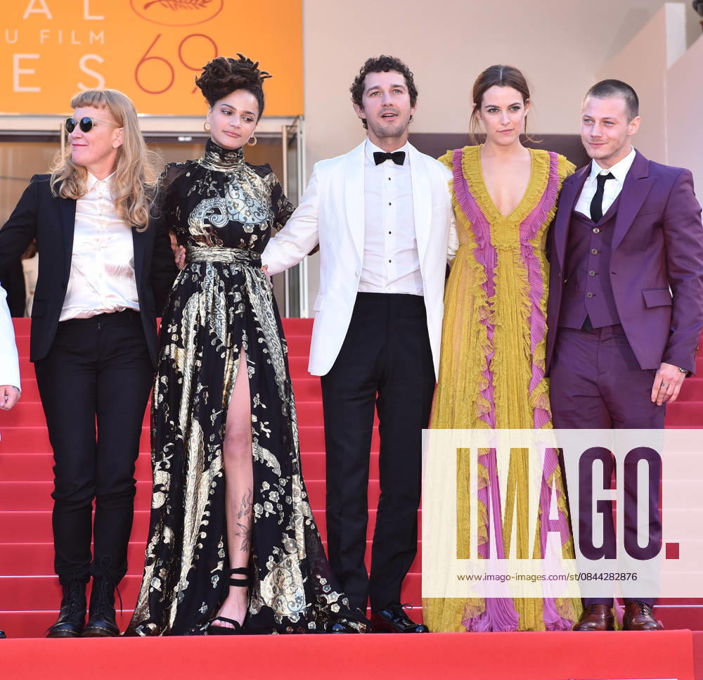 69th Cannes Film Festival - From The Land Of The Moon (Mal De Pierres) CANNES, FRANCE - MAY 15: US actress Riley Keough (2nd R) and US actor Shia LaBeouf (C) leave after the screening of the film American Honey at the 69th international film festival in Cannes on May 15, 2016. Provence-Alpes-Cote d Azur France. Editorial use only. Please get in touch for any other usage.