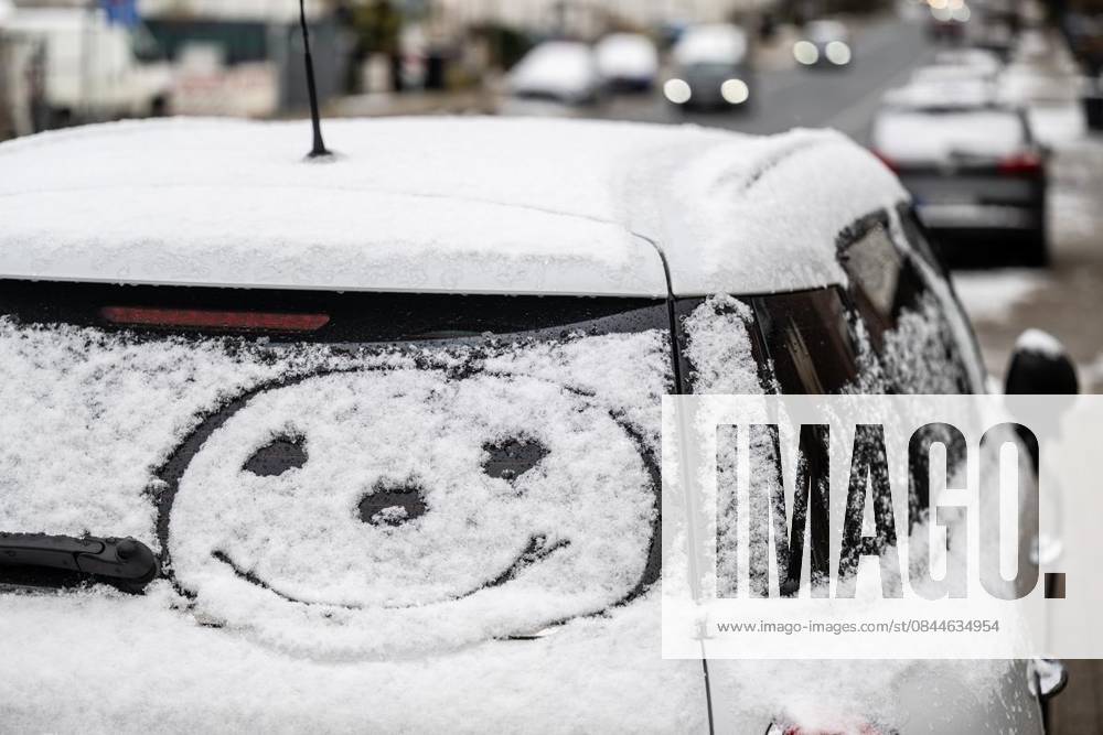 Winter in Mülheim an der Ruhr A large smiley face is painted in the snow clinging to the rear window of a car in Mülheim an der Ruhr, Germany NRW Mülheim an der Ruhr Copyright MartinxMöller on Saturday