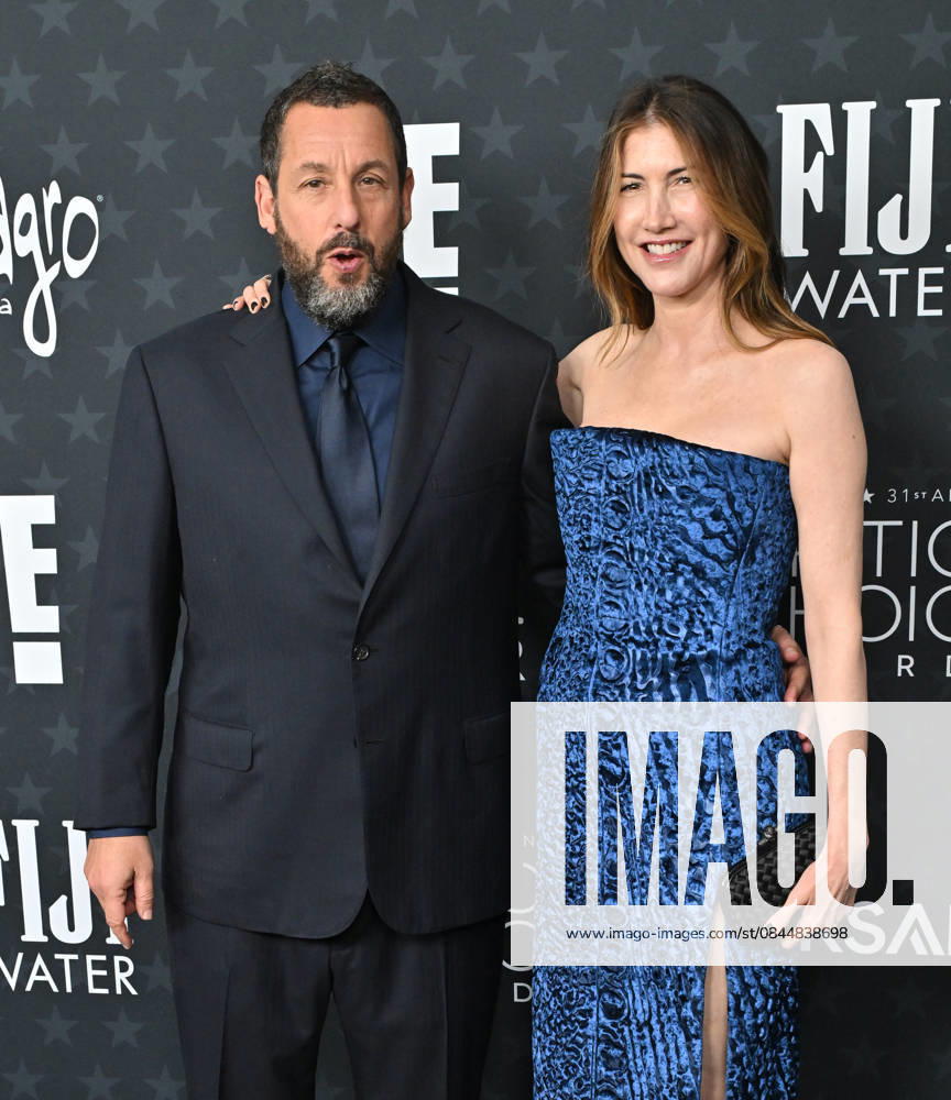 31st Annual Critics Choice Awards - Arrivals Adam Sandler and Jackie Sandler arriving to 31st Annual Critics Choice Awards - Arrivals at Barker Hanger on January 04, 2026 in Santa Monica, CA. Santa Monica Barker Hanger California USA