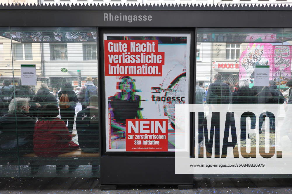 Basel, SWITZERLAND, A No poster for the halving initiative SRG initiative at a streetcar stop Referendum on March 8, 2026