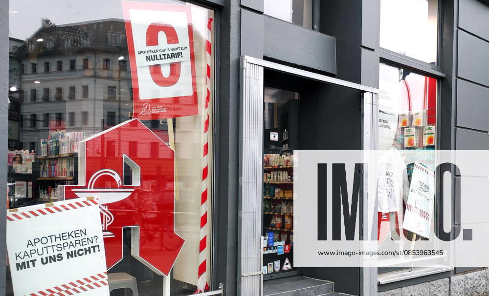 Berlin Germany Posters in shop windows draw attention to the situation of pharmacies