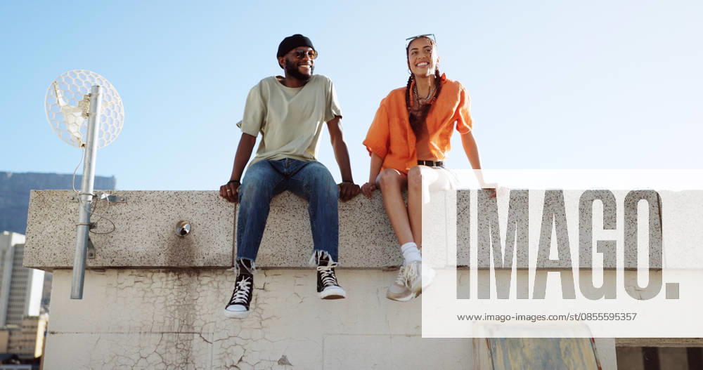Rooftop, relax and friends for social conversation together in cool wind, sunshine and blue sky mock up space for advertising gen z youth aesthetic. Happy black people couple on urban city building. (License=RF) ,model released, Symbolfoto