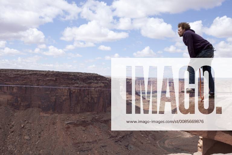 Andy Lewis highlining at the Fruit Bowl in Moab, Utah., Moab Utah United States