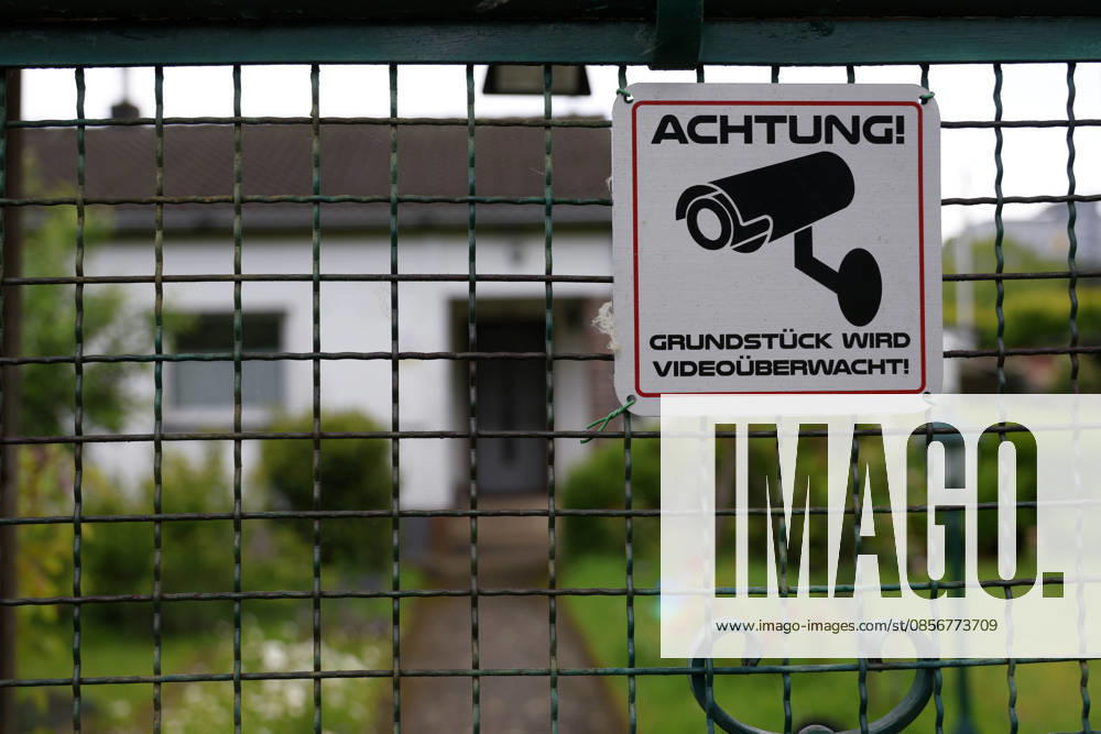 Sign for video surveillance of a plot of land in the Buschermühle allotment garden site in Düsseldorf Mörsenbroich