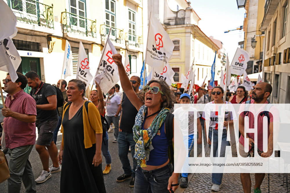 Nationwide Strike For Workers Lisbon LISBON, PORTUGAL - JUNE 03: Protesters hold a banner and wave red trade union flags as they line the streets during a national mobilization in Lisbon, Portugal on June 03, 2026. The demonstration, organized under the National Fight Day motto, demands increased wages, guaranteed labor rights, and measures against the rising cost of living, while advocating for the right to health and housing. Zed Jameson Anadolu Lisbon Portugal. Editorial use only. Please get in touch for any other usage.