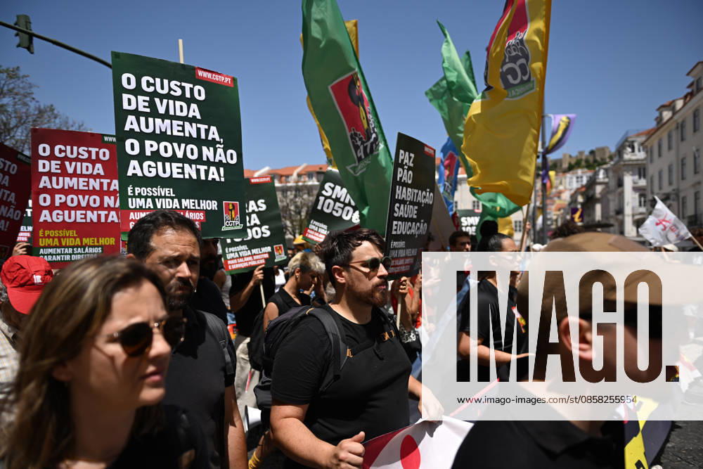 Nationwide Strike For Workers Lisbon LISBON, PORTUGAL - JUNE 03: Protesters hold a banner and wave red trade union flags as they line the streets during a national mobilization in Lisbon, Portugal on June 03, 2026. The demonstration, organized under the National Fight Day motto, demands increased wages, guaranteed labor rights, and measures against the rising cost of living, while advocating for the right to health and housing. Zed Jameson Anadolu Lisbon Portugal. Editorial use only. Please get in touch for any other usage.
