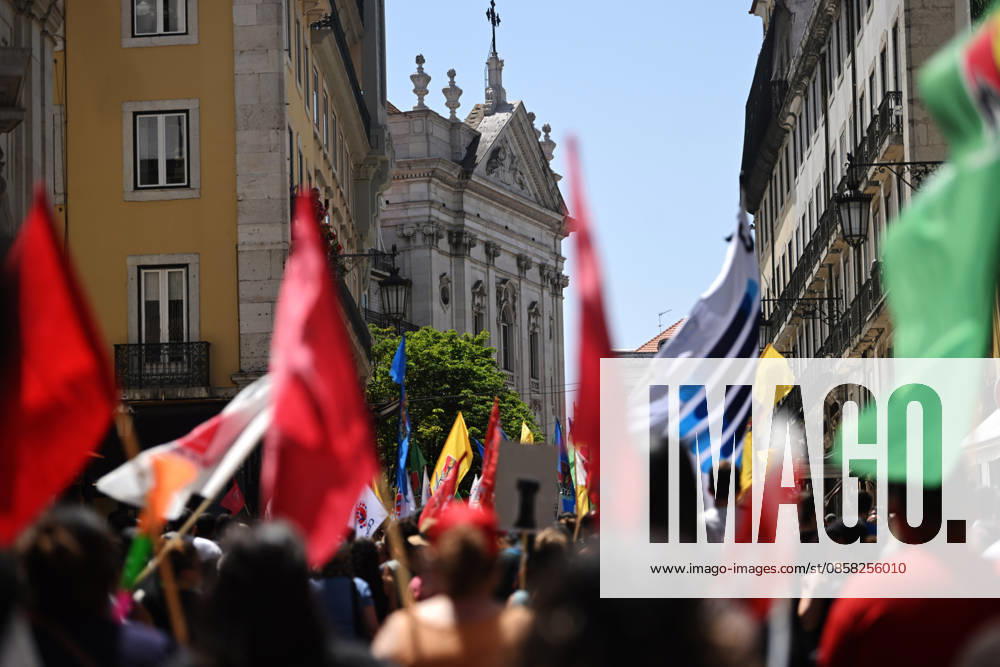 Nationwide Strike For Workers Lisbon LISBON, PORTUGAL - JUNE 03: Protesters hold a banner and wave red trade union flags as they line the streets during a national mobilization in Lisbon, Portugal on June 03, 2026. The demonstration, organized under the National Fight Day motto, demands increased wages, guaranteed labor rights, and measures against the rising cost of living, while advocating for the right to health and housing. Zed Jameson Anadolu Lisbon Portugal. Editorial use only. Please get in touch for any other usage.