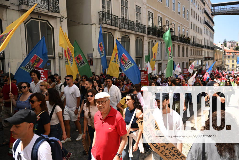 Nationwide Strike For Workers Lisbon LISBON, PORTUGAL - JUNE 03: Protesters hold a banner and wave red trade union flags as they line the streets during a national mobilization in Lisbon, Portugal on June 03, 2026. The demonstration, organized under the National Fight Day motto, demands increased wages, guaranteed labor rights, and measures against the rising cost of living, while advocating for the right to health and housing. Zed Jameson Anadolu Lisbon Portugal. Editorial use only. Please get in touch for any other usage.
