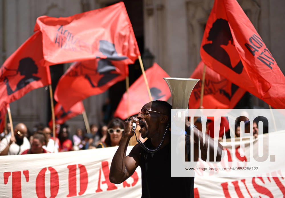 Nationwide Strike For Workers Lisbon LISBON, PORTUGAL - JUNE 03: Protesters hold a banner and wave red trade union flags as they line the streets during a national mobilization in Lisbon, Portugal on June 03, 2026. The demonstration, organized under the National Fight Day motto, demands increased wages, guaranteed labor rights, and measures against the rising cost of living, while advocating for the right to health and housing. Zed Jameson Anadolu Lisbon Portugal. Editorial use only. Please get in touch for any other usage.
