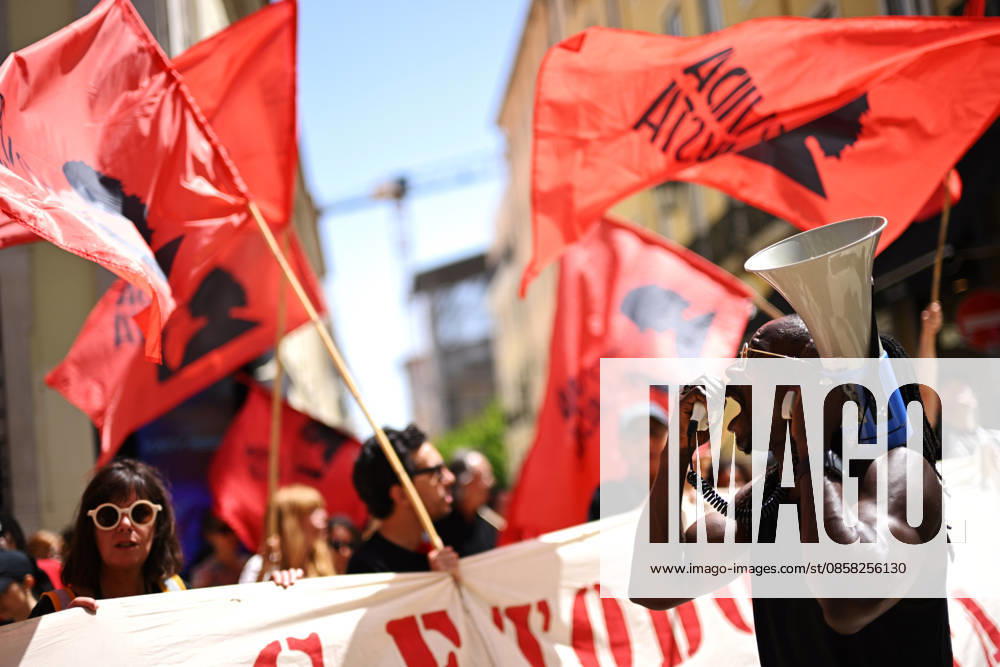 Nationwide Strike For Workers Lisbon LISBON, PORTUGAL - JUNE 03: Protesters hold a banner and wave red trade union flags as they line the streets during a national mobilization in Lisbon, Portugal on June 03, 2026. The demonstration, organized under the National Fight Day motto, demands increased wages, guaranteed labor rights, and measures against the rising cost of living, while advocating for the right to health and housing. Zed Jameson Anadolu Lisbon Portugal. Editorial use only. Please get in touch for any other usage.