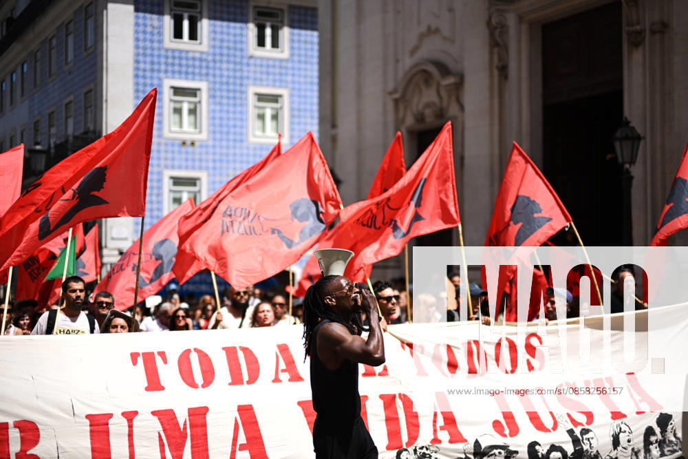 Nationwide Strike For Workers Lisbon LISBON, PORTUGAL - JUNE 03: Protesters hold a banner and wave red trade union flags as they line the streets during a national mobilization in Lisbon, Portugal on June 03, 2026. The demonstration, organized under the National Fight Day motto, demands increased wages, guaranteed labor rights, and measures against the rising cost of living, while advocating for the right to health and housing. Zed Jameson Anadolu Lisbon Portugal. Editorial use only. Please get in touch for any other usage.