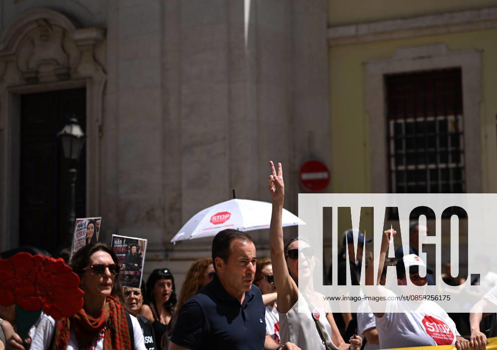 Nationwide Strike For Workers Lisbon LISBON, PORTUGAL - JUNE 03: Protesters hold a banner and wave red trade union flags as they line the streets during a national mobilization in Lisbon, Portugal on June 03, 2026. The demonstration, organized under the National Fight Day motto, demands increased wages, guaranteed labor rights, and measures against the rising cost of living, while advocating for the right to health and housing. Zed Jameson Anadolu Lisbon Portugal. Editorial use only. Please get in touch for any other usage.