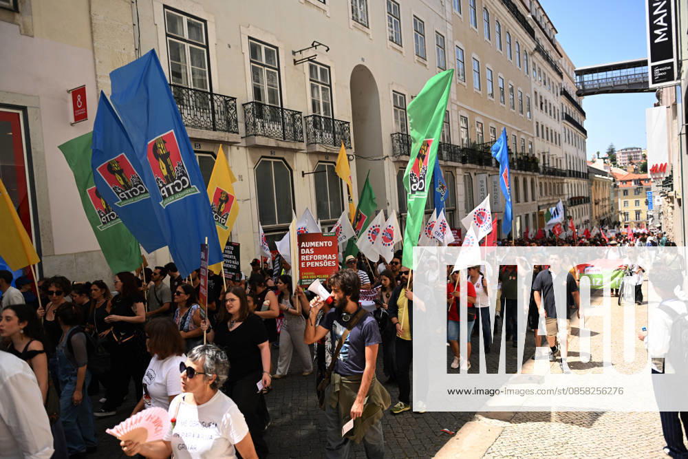 Nationwide Strike For Workers Lisbon LISBON, PORTUGAL - JUNE 03: Protesters hold a banner and wave red trade union flags as they line the streets during a national mobilization in Lisbon, Portugal on June 03, 2026. The demonstration, organized under the National Fight Day motto, demands increased wages, guaranteed labor rights, and measures against the rising cost of living, while advocating for the right to health and housing. Zed Jameson Anadolu Lisbon Portugal. Editorial use only. Please get in touch for any other usage.