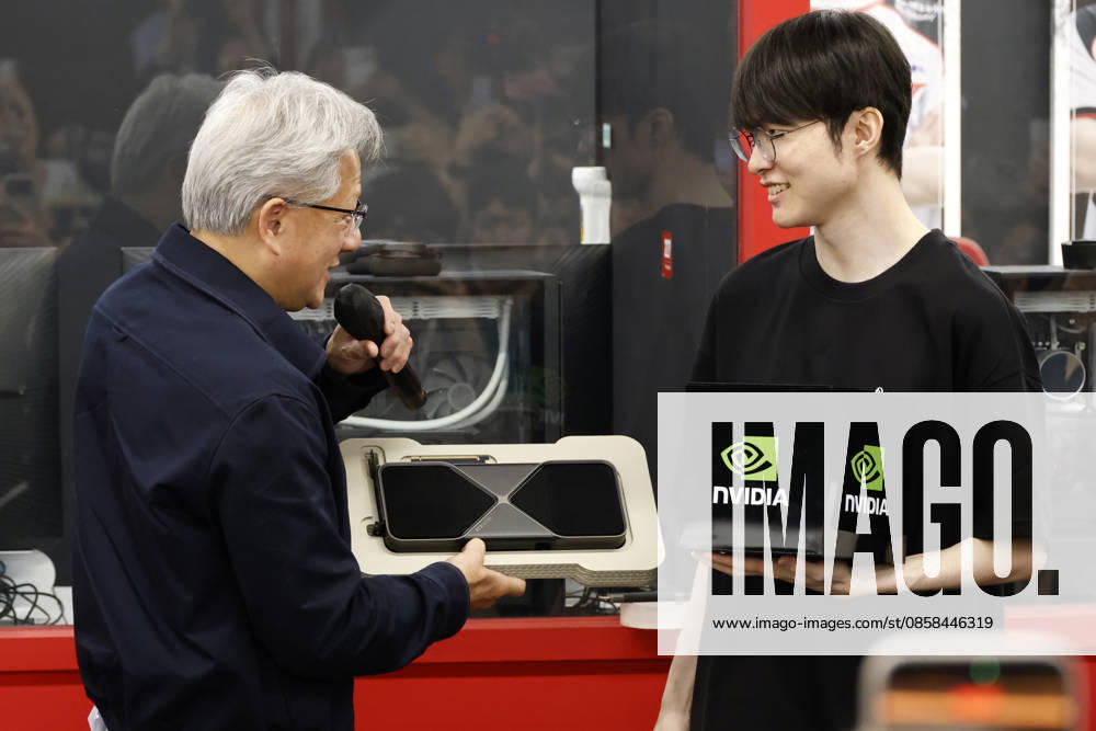 Nvidia CEO jensen huang visits T1 base camp, meets Faker in Seoul Jensen Huang (L), chief executive officer of Nvidia, exchanges autographed merchandise with professional League of Legends player Lee Sang-hyeok Faker (R) of South Korean esports organization T1 at T1 Base Camp in Seoul, South Korea, on June 05, 2026. Seoul South Korea