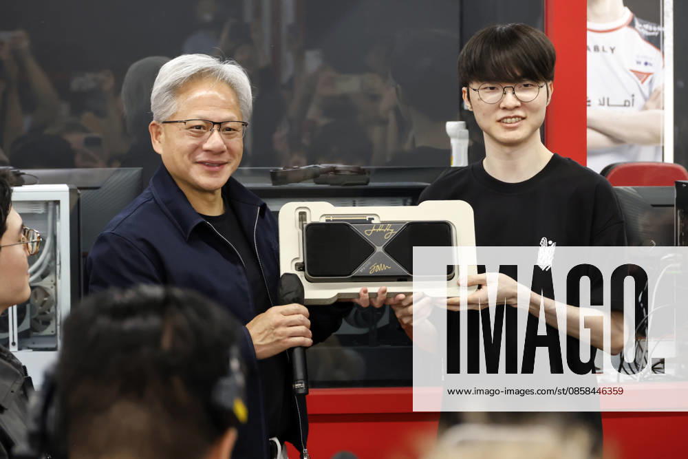 Nvidia CEO jensen huang visits T1 base camp, meets Faker in Seoul Jensen Huang (L), chief executive officer of Nvidia, exchanges autographed merchandise with professional League of Legends player Lee Sang-hyeok Faker (R) of South Korean esports organization T1 at T1 Base Camp in Seoul, South Korea, on June 05, 2026. Seoul South Korea