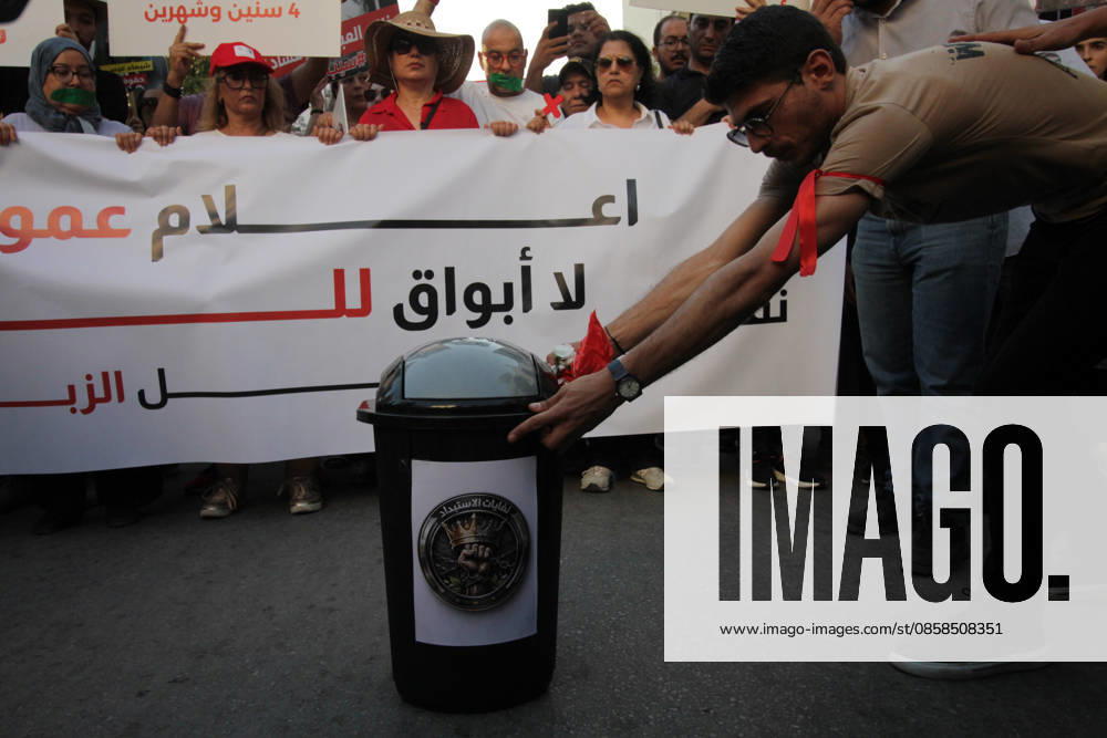 Demonstrators march through central Tunis during a protest demanding freedom of expression, independent public media, and an end to legal measures they say criminalize free speech, on June 5, 2026. The rally was organized in opposition to Decree-Law 54 and reflects growing concerns among civil society groups over restrictions on media freedoms and political dissent in Tunisia. Tunis Tunisia - ZUMAm342 20260605_zsp_m342_011