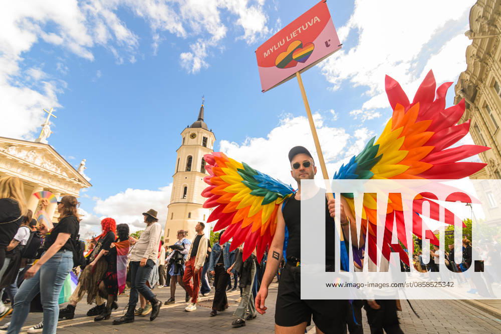 A participant wearing rainbow wings holds a placard saying Myliu Lietuv? (I love Lithuania) during the pride parade. Vilnius on June 6 marked Lithuanian Pride 2026 with a march for equality, drawing thousands to the city center in a public show of visibility, solidarity, and support for LGBTQ+ rights. Vilnius Lithuania - ZUMAs197 20260606_aaa_s197_201