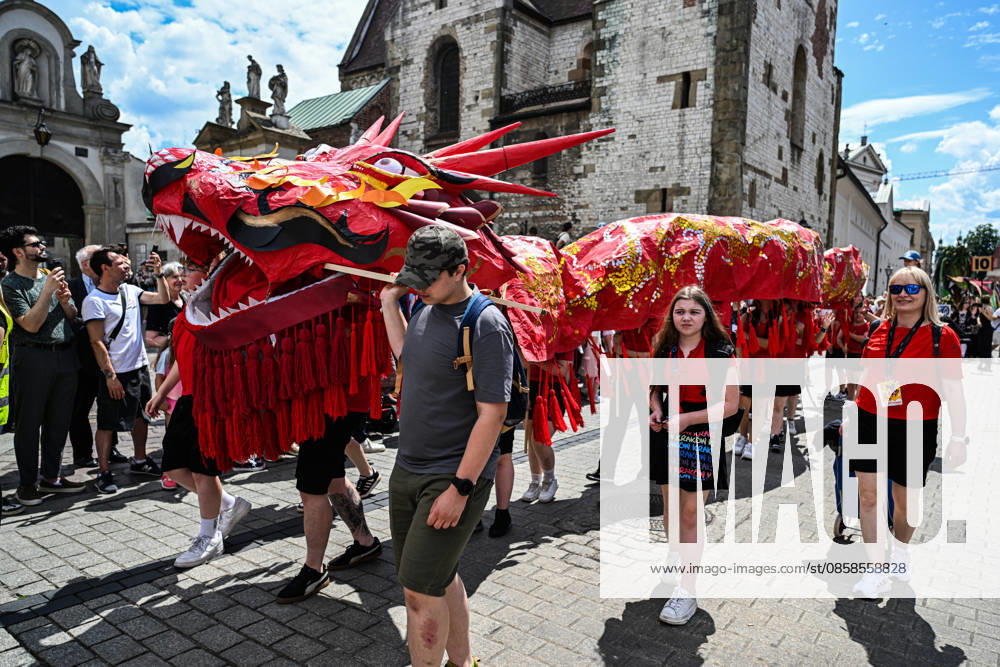 Poland s 25th Dragon Parade in Krakow KRAKOW, POLAND - JUNE 07: People take part the Dragon Parade during the 25th Great Dragon Parade edition at the Main Square, Krakow, Poland, on June 07, 2026. For the 25th year in a row, Krakow brings the annual celebration representing the myth of Dragon, the city symbol. Omar Marques Anadolu Krakow Poland. Editorial use only. Please get in touch for any other usage.