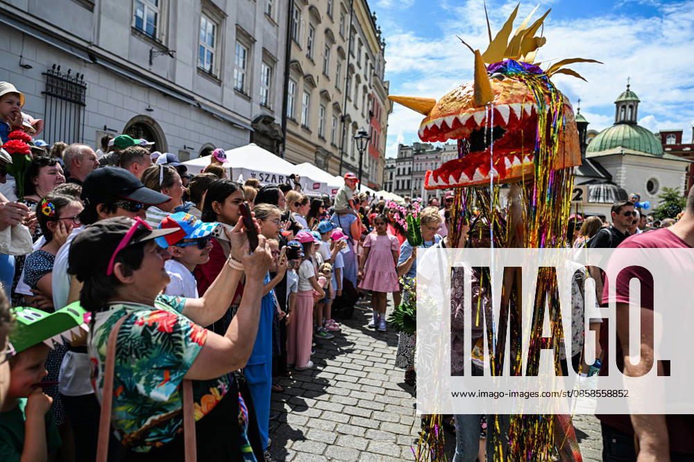 Poland s 25th Dragon Parade in Krakow KRAKOW, POLAND - JUNE 07: People take part the Dragon Parade during the 25th Great Dragon Parade edition at the Main Square, Krakow, Poland, on June 07, 2026. For the 25th year in a row, Krakow brings the annual celebration representing the myth of Dragon, the city symbol. Omar Marques Anadolu Krakow Poland. Editorial use only. Please get in touch for any other usage.