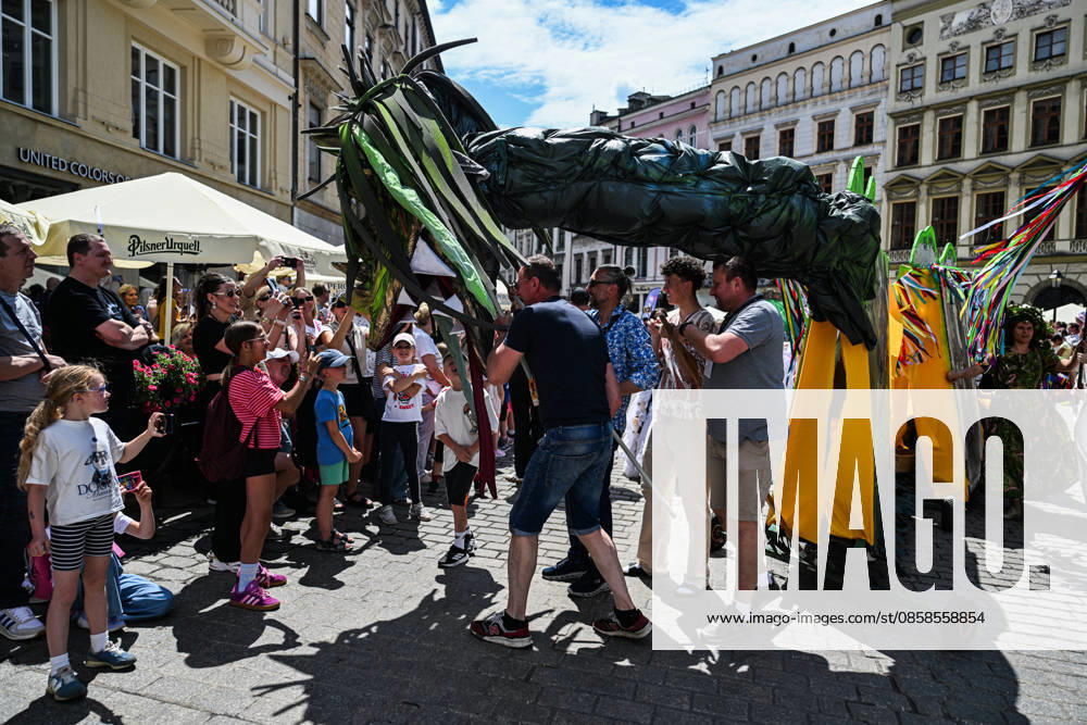 Poland s 25th Dragon Parade in Krakow KRAKOW, POLAND - JUNE 07: People take part the Dragon Parade during the 25th Great Dragon Parade edition at the Main Square, Krakow, Poland, on June 07, 2026. For the 25th year in a row, Krakow brings the annual celebration representing the myth of Dragon, the city symbol. Omar Marques Anadolu Krakow Poland. Editorial use only. Please get in touch for any other usage.