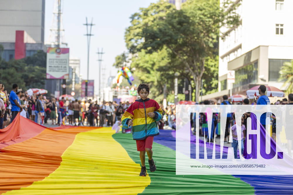 JUNE 07, 2026: Participants gather during the 30th edition of the Sao Paulo LGBT+ Pride Parade at Paulista Avenue in Sao Paulo, Brazil, on June 7, 2026. Widely considered the largest Pride parade in the world, this year s landmark 30-year anniversary featured the official theme A rua convoca, a urna confirma (The street summons, the ballot box confirms), emphasizing political participation and social mobilization ahead of municipal and general elections. Despite facing a 60% drop in private corporate sponsorshipsâ€which forced 14 sound trucks onto the avenue instead of the usual 17â€millions of people took to the streets to protest conservative legislative backlashes and celebrate - ZUMAv146 20260607_zip_v146_007