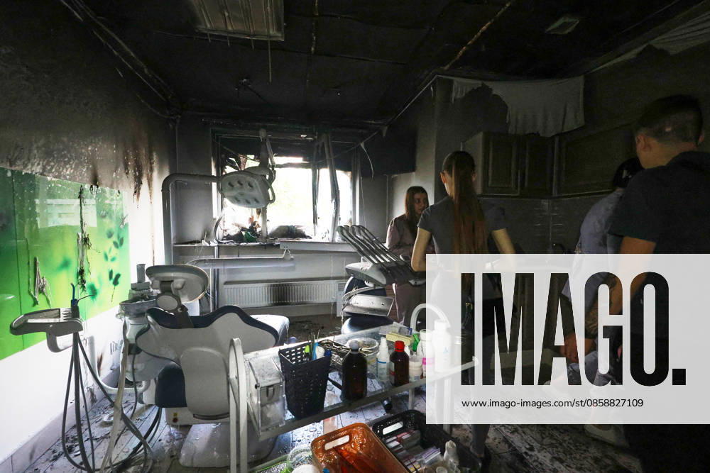 People stay in a dental office in an apartment block, damaged by a Russian drone attack on a district of Kharkiv, Ukraine, June 10, 2026. Russian forces struck the northeastern city with drones, injuring at least eight people. One of the drones hit an apartment block, housing a dental office. (Photo by Viacheslav Madiievskyi Ukrinform) Russians damage dental office in Kharkiv