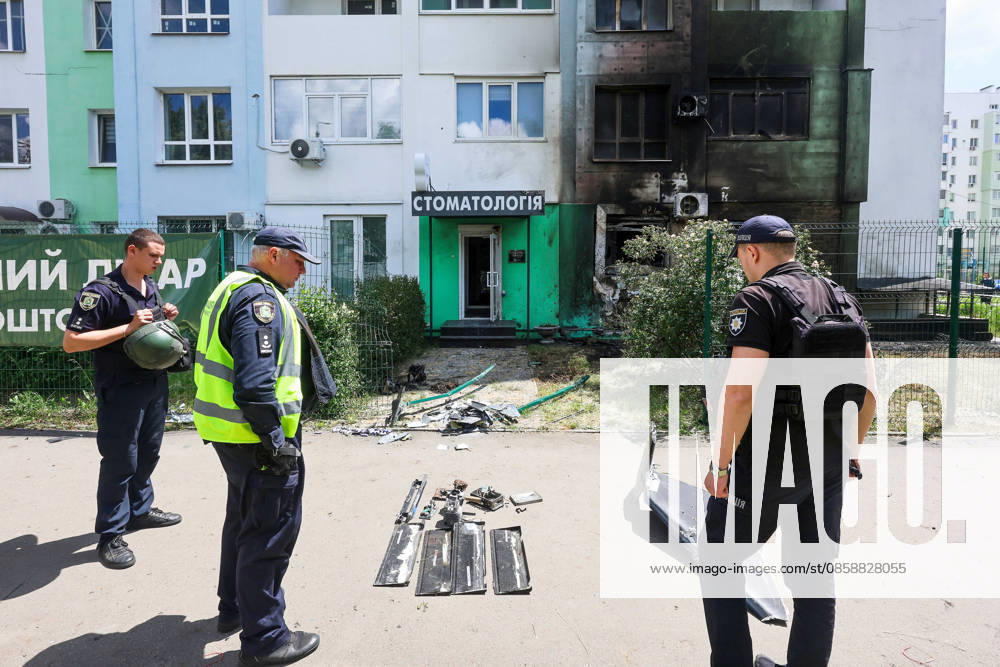Russians damage dental office in Kharkiv Law enforcement officers examine the wreckage of a strike drone used by Russian forces to attack a district of Kharkiv, Ukraine, June 10, 2026. Russian forces struck the northeastern city with drones, injuring at least eight people. One of the drones hit an apartment block, housing a dental office., Credit:Viacheslav Madiievskyi Ukrinform Avalon Ukraine, Kharkiv
