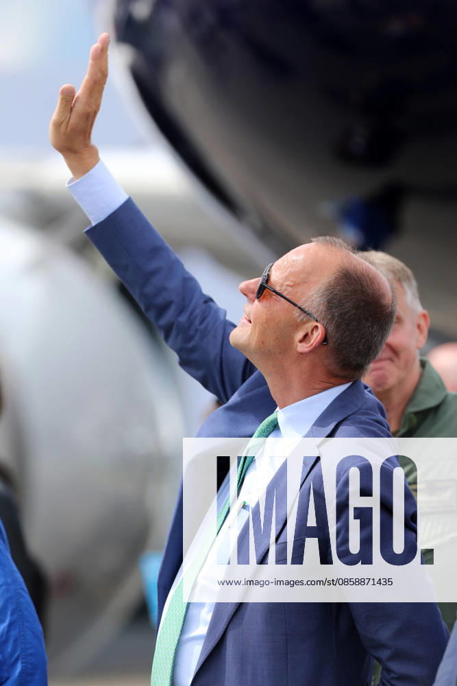 Chancellor Friedrich Merz CDU during his visit to the ILA on June 10, 2026 in Berlin Chancellor Friedrich Merz CDU during his visit to the ILA on June 10, 2026 in Berlin Chancellor Friedrich Merz CDU during his visit to the ILA on June 10, 2026 in Berlin Chancellor Friedrich Merz observes the air show and looks up into the sky with sunglasses Berlin Brandenbu