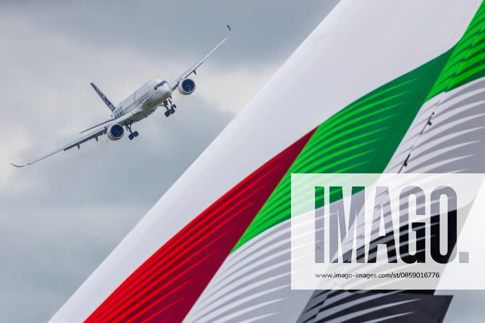 Trade visitor day at ILA Berlin 2026, Berlin, 12 06 2026 An Airbus A350 1000 with ANA livery on low approach, in the foreground the striking tail unit of an Emirates Airbus A380 in the colors of the United Arab Emirates Both aircraft are part of the flight demonstrations at ILA 2026 Schöneberg Berlin ExpoCenter Airport Brandenburg Germany 20260612-1V9A1834-M4000