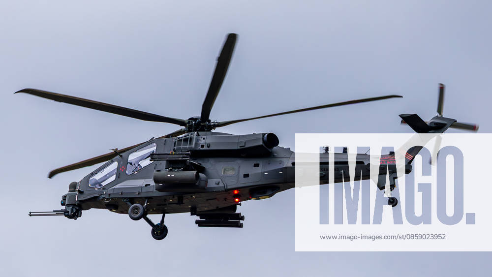 Trade visitor day at ILA Berlin 2026, Berlin, 12 06 2026 An armed Leonardo AW249 combat helicopter in flight against an overcast sky The aircraft bears the registration CSX82163 and is equipped with a nose cannon and weapon mounts under the fuselage Schöneberg Berlin ExpoCenter Airport Brandenburg Germany 20260612-1V9A3016-M4000