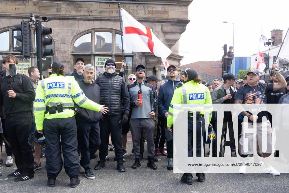 Anti-immigration protest march, Walton, Liverpool, UK, 13 June 2026. A large police presence prevents major disorder at an anti-immigration, pro-deportation protest march in Walton, Liverpool, UK, 13 June 2026., Credit:John Johnson Avalon