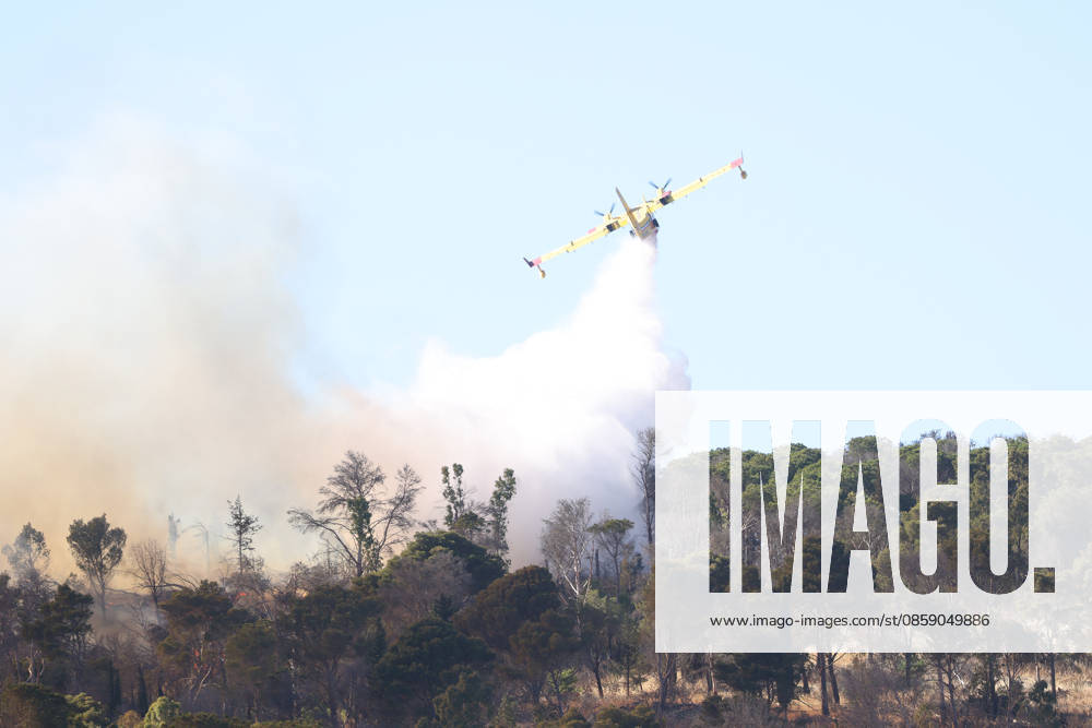 Firefighters response to wildfires in two regions in southern Italy SICILY, ITALY - JUNE 13: Two Canadair aircraft and three helicopters take part in an extinguishing work after a large fire has broken out in Montagna Grande, a town in Salemi, near Trapani in Sicily, Italy on June 13, 2026. Alberto Lo Bianco Anadolu Sicily Italy. Editorial use only. Please get in touch for any other usage.